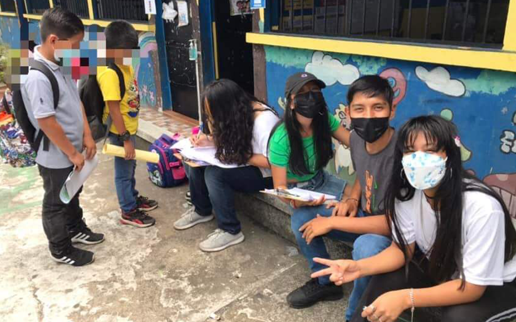 En Samayac, Suchitepéquez, niñas y niños de centros educativos proporcionan información sobre el retorno a clases 2022